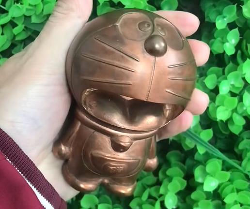 磁力清洗機(jī)對(duì)黃銅卡通工藝品去氧化層清洗拋光